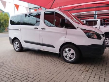 2016 Ford Tourneo Custom 2.2 TDCi Ambiente LWB - ABS,AIRCON,ELECTRIC WINDOWS,TOWBAR,AIRBAGS,ALARM,FULL-SERVICE RECORD,RADIO,BLUETOOTH,AUX,CD,SPARE KEYS. Finance available, Trade-ins welcome, Delivery country wide, T&C'S apply!!!